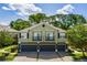 Inviting two-story townhome featuring individual garages, balconies, and a well-kept lawn at 1552 Broken Oak Dr # B, Winter Garden, FL 34787