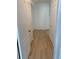 Hallway with light colored wood floor and doors at 1552 Broken Oak Dr # B, Winter Garden, FL 34787