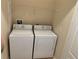 Laundry room featuring a white washer and dryer at 1552 Broken Oak Dr # B, Winter Garden, FL 34787