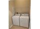 Laundry room featuring a white washer and dryer at 1552 Broken Oak Dr # B, Winter Garden, FL 34787