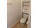Powder room toilet with built-in shelving at 1552 Broken Oak Dr # B, Winter Garden, FL 34787