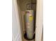 A.O. Smith water heater in closet with tile flooring at 1552 Broken Oak Dr # B, Winter Garden, FL 34787