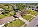 This aerial photo captures the home, long driveway, and ample backyard space for recreation and outdoor enjoyment at 1725 Marcia Dr, Orlando, FL 32807