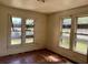 Bedroom with classic wood floors and bright natural light at 1811 S Westmoreland Dr, Orlando, FL 32805