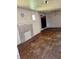 Spacious living room features hardwood floors, fireplace and traditional chandelier at 1811 S Westmoreland Dr, Orlando, FL 32805