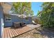 Wooden backyard deck featuring outdoor furniture at 1815 6Th Se St, Winter Haven, FL 33880