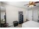 Bedroom with a ceiling fan and built in closet at 1815 6Th Se St, Winter Haven, FL 33880
