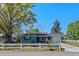 Charming single-story home with a well-manicured lawn, inviting front porch and a one car garage at 1815 6Th Se St, Winter Haven, FL 33880