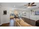 Open floor plan showcasing the living room, dining area, and kitchen with modern finishes at 1815 6Th Se St, Winter Haven, FL 33880