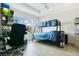 Functional bedroom with a bunk bed, work space, and great natural light at 1959 Keel Ct, The Villages, FL 34762