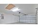 Spacious garage with automatic door at 1959 Keel Ct, The Villages, FL 34762