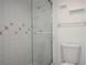 Clean, all-white tiled shower-tub and toilet area is showcased in this bathroom at 200 Maitland Ave # 86, Altamonte Springs, FL 32701