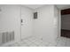Bright foyer with tiled floors, a white door, and access to other rooms at 200 Maitland Ave # 86, Altamonte Springs, FL 32701