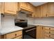 Kitchen with modern stainless steel range, light countertops, and wood cabinetry at 200 Maitland Ave # 86, Altamonte Springs, FL 32701