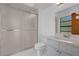 Bathroom featuring a sliding glass door shower, standard toilet, and vanity with mirror at 20240 Sw 95Th St, Dunnellon, FL 34431