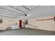 Spacious garage with laundry area, utility sink, and ample storage space at 20240 Sw 95Th St, Dunnellon, FL 34431