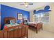 Themed bedroom includes two twin beds with themed bedding and decor at 2508 Archfeld Blvd, Kissimmee, FL 34747