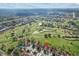 Beautiful aerial view of houses bordering a golf course, offering serene landscapes and leisure activities at 2630 Albion Ave, Orlando, FL 32833