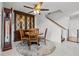Cozy dining area with wood table and chairs next to the staircase at 2630 Albion Ave, Orlando, FL 32833