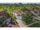 Beautiful home exterior featuring a red tile roof and attached two car garage at 2630 Albion Ave, Orlando, FL 32833