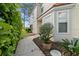 Charming front entrance with lush landscaping and a welcoming walkway at 2630 Albion Ave, Orlando, FL 32833
