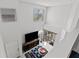 Open concept living room with high ceilings and a sliding glass door leading to a patio at 2630 Albion Ave, Orlando, FL 32833