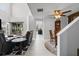 Open concept living and dining area with neutral tile flooring and natural light at 2630 Albion Ave, Orlando, FL 32833