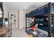 Fun room featuring space decor, desk and loft bed at 2725 Serenity Garden Dr, Kissimmee, FL 34744