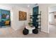 Bright office nook with shelving, a desk, and plenty of natural light from the window at 2725 Serenity Garden Dr, Kissimmee, FL 34744