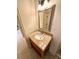 Bathroom featuring a granite vanity top, framed mirror, and a faucet at 2822 Bella Vista Dr, Davenport, FL 33897