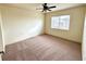 Bright bedroom with natural light and neutral carpet at 2822 Bella Vista Dr, Davenport, FL 33897