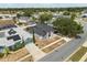 A charming home with a well-maintained lawn, showcasing curb appeal and neighborhood charm at 2930 Paddington Way, Kissimmee, FL 34747