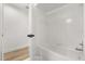 Clean bathroom with white tiled tub and shower at 2930 Paddington Way, Kissimmee, FL 34747
