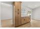 Bright kitchen with light wood cabinets and stainless steel appliances at 2930 Paddington Way, Kissimmee, FL 34747