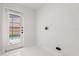 Bright mud room with tile floors and access to the pool at 2930 Paddington Way, Kissimmee, FL 34747
