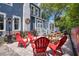 Outdoor patio featuring brick pavers, picnic tables, and a vibrant mural, great for entertaining at 301 S Palmetto Ave, Sanford, FL 32771