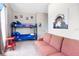 A colorful room with a bunk bed and a playful urban art theme at 301 S Palmetto Ave, Sanford, FL 32771