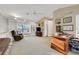 Spacious room with built-in shelving, comfortable seating, and lots of natural light at 3156 Winding Pine Trl, Longwood, FL 32779