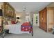 Stylish main bedroom featuring a decorative tapestry, ceiling fan, and walk-in closet at 3156 Winding Pine Trl, Longwood, FL 32779