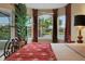 Bright main bedroom with views of the lake, golf course, and access to pool area at 3156 Winding Pine Trl, Longwood, FL 32779