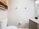 Updated half bathroom features a modern vanity and updated toilet at 3408 Idlegrove Ct, Orlando, FL 32822
