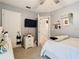 Bedroom with light-colored walls, a ceiling fan, and decorative wall shelves at 3408 Idlegrove Ct, Orlando, FL 32822