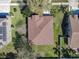 Aerial shot of the roofline, landscaping, and overall property layout showcasing the curb appeal at 3620 Chandler Estates Dr, Apopka, FL 32712