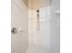 Clean and modern shower stall featuring white tiles and a chrome shower head at 3620 Chandler Estates Dr, Apopka, FL 32712
