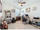 Well-lit home office space with shelving for decorations, a computer, and a printer at 3764 Shoveler Ave, Leesburg, FL 34748