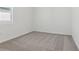 Bedroom features carpet flooring and natural light at 3872 Giorgio Dr, Winter Haven, FL 33884