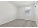 Cozy bedroom with carpet flooring and natural light at 3872 Giorgio Dr, Winter Haven, FL 33884