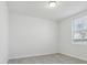 Minimalist bedroom with neutral tile flooring and ample natural light at 3872 Giorgio Dr, Winter Haven, FL 33884