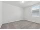 Bright bedroom featuring carpet flooring and natural light at 3872 Giorgio Dr, Winter Haven, FL 33884