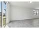 Living room with tile flooring and natural light coming from a sliding door at 3872 Giorgio Dr, Winter Haven, FL 33884